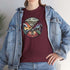 The In My Element t-shirt features a striking circular graphic representing the four classical elements—Fire, Water, Wind, and Earth.